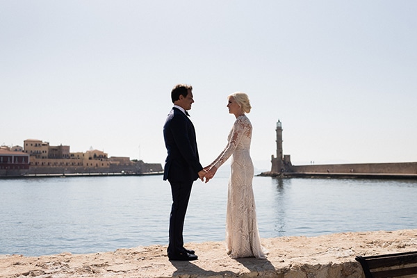Intimate destination elopement in Crete with greenery and white flowers | Kat & Joe