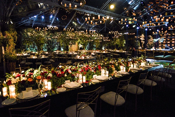 Impressive garden wedding decoration with atmospheric lighting
