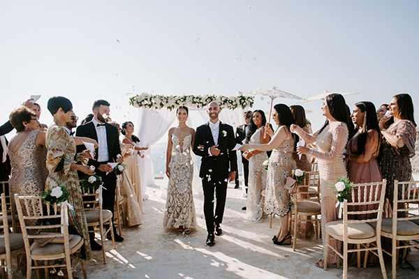 Intimate wedding in Santorini with romantic blooms and fairy lights │ Gayana & Steve