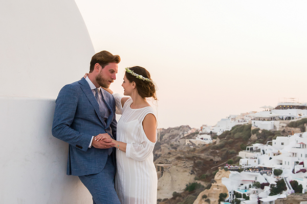 Summer romantic wedding in Santorini with white peonies and roses │ Georgia & Ilias