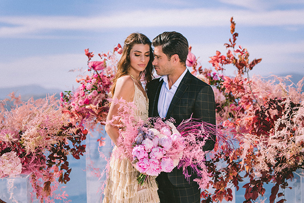 Elegant wedding inspiration with soft and hot pinks in Santorini