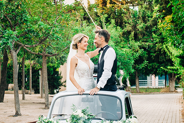 Gorgeous summer wedding in Athens with white blooms and lush greenery │ Chara & Aris
