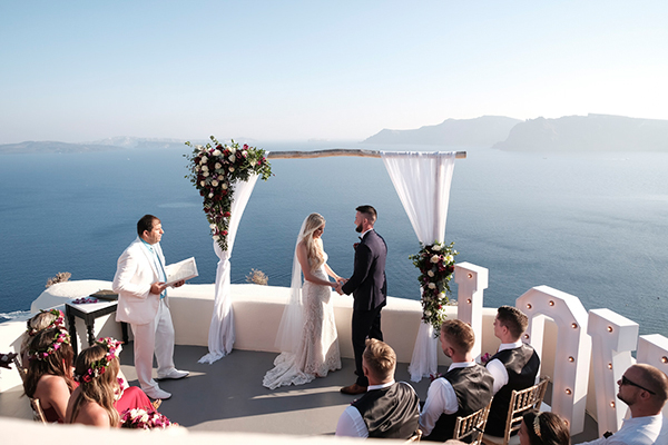Intimate wedding in Santorini with calla lilies ǀ Stacey & Tyler