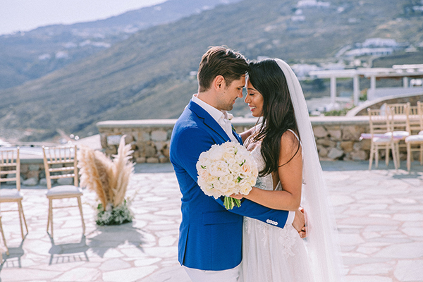 Summer romantic wedding in Mykonos with white blooms │Roxanne & Mark