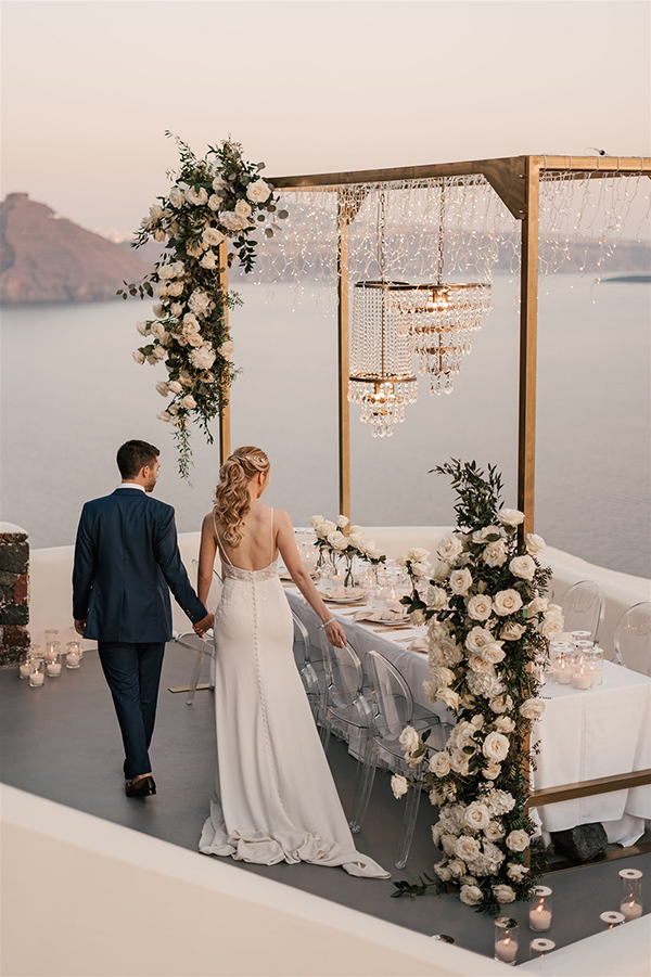 stylish-destination-wedding-santorini-breathtaking-views-romantic-florals_35
