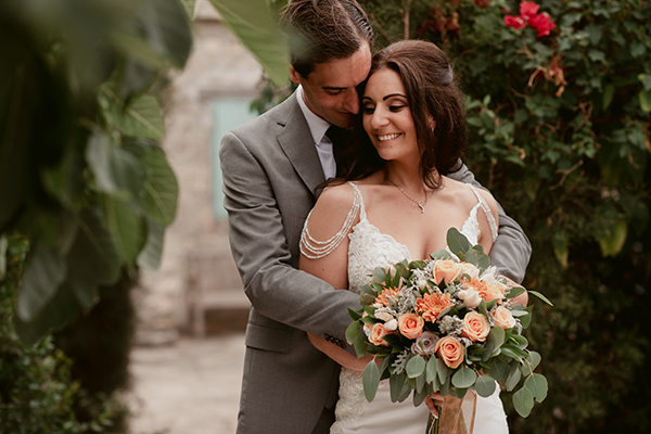 Beautiful summer wedding in Paphos with roses in white and light orange tones │ Nicole & Colin
