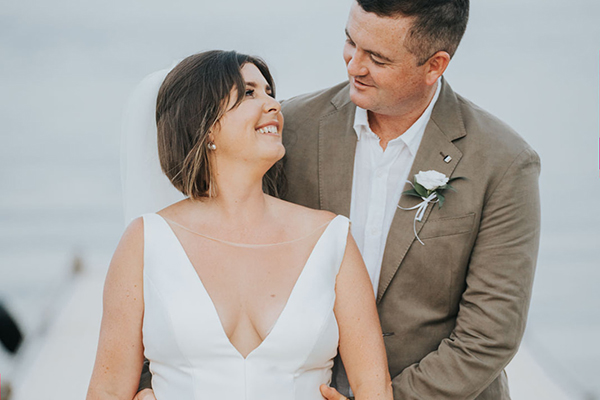 Summer destination wedding in Lefkada with a sage green theme and pretty white flowers│ Laura & Alan