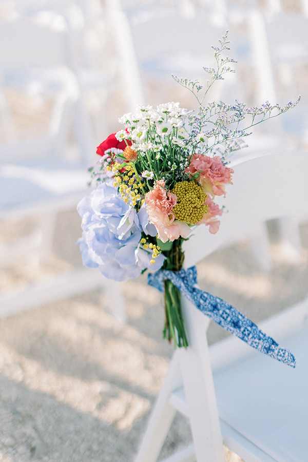 stylish-summer-wedding-nava-seaside-colorful-flowers_28