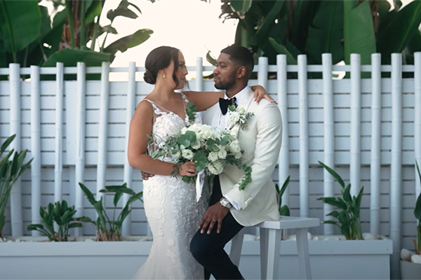 Romantic wedding video at Galu Seaside with white flowers | Elena & Kieran
